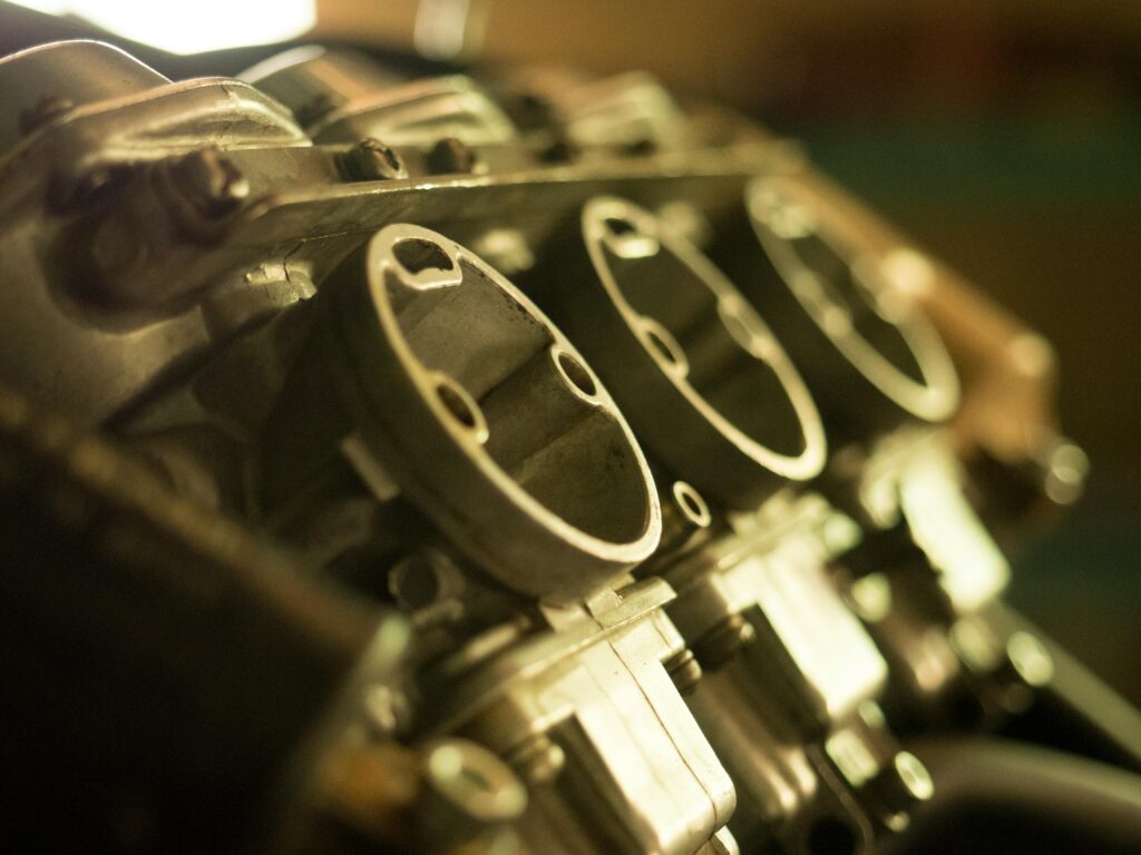 Detailed view of a metal engine component showcasing precise engineering.